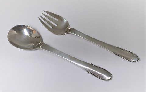 Georg Jensen. Silberbesteck. Kugle. Sterling (925). Salatbesteck. Länge 21,7 cm.