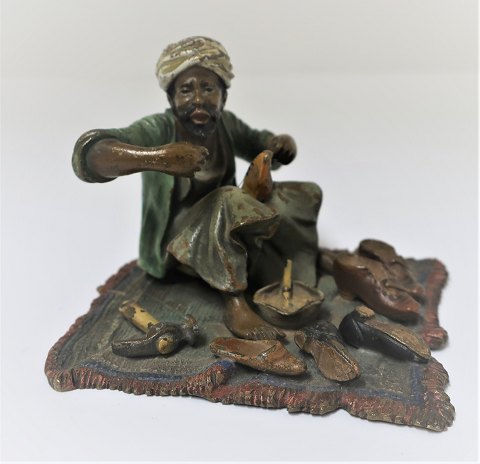 Wiener Bronze figure. Motif Arabic shoemaker. Height 7 cm. Length 8.5 cm