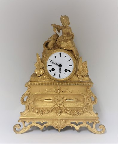 Bronze clock. Produced around 1840. Height 33 cm. Clockwork works