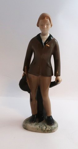 Bing & Grøndahl. Figur. Pige i ridetøj. Model # 2369. Højde 21 cm. ( 1 sortering 
)