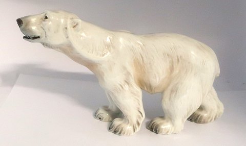 Dahl Jensen. Porzellanfigur. Stehender Eisbär. Modell 1156. Länge 36 cm. Höhe 19 
cm. (1 Wahl)