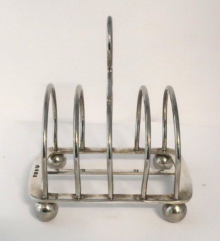 Elkington. Engelsk toastholder i sterling sølv (925). Længde 12 cm. Højde 13,5 cm. Produceret Birmingham 1907.