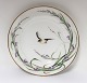 Royal Copenhagen. Dinner plates with bird motif. Diameter 23 cm. Produced 
approx. 1850. (1 quality)