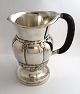 Georg Jensen. Design 7. Sølvkande. Sterling (925). Design; Georg Jensen. Højde 
20 cm. 
